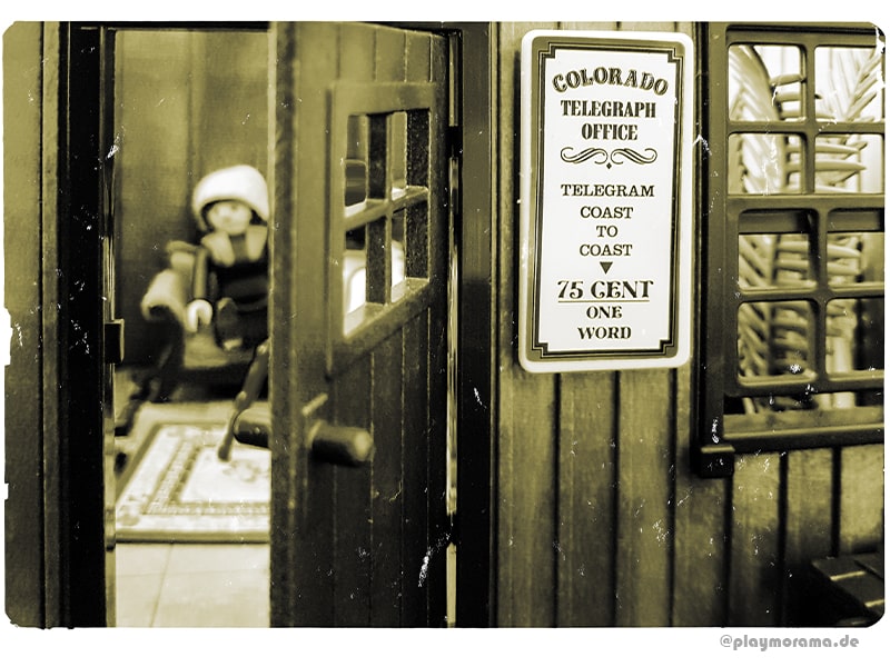 Telegraph Office an der Western Station. Es zeigt ein Schild mit der Aufschrift: "Telegram Coast to Coast 75 Cent one word"
