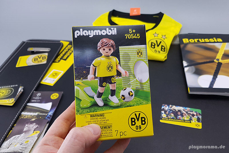 PLAYMOBIL-Sonderfigur BVB-Fußballer in Shirt und Hose mit BVB-Logo, mit Einhand-Kickfunktion und Ball mit cooler Grafik. Außerdem inkl. toller Torwand aus Karton im BVB-Design für das Schusstraining.
